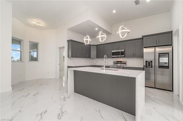 Interior, Kitchen, Marble, Pendant Lights, Recessed Lighting, Stainless Steel Appliances