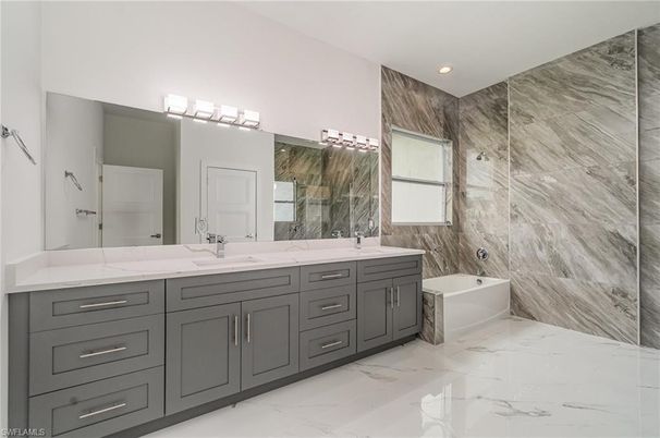 Bathroom, Dual Sink Vanities, Interior, Marble, Marble Walls, Recessed Lighting