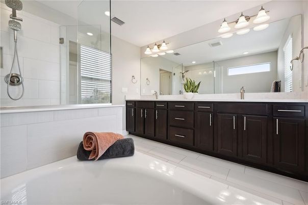 Bathroom, Dual Sink Vanities, Glass Shower, Interior, Recessed Lighting, Tile Countertops