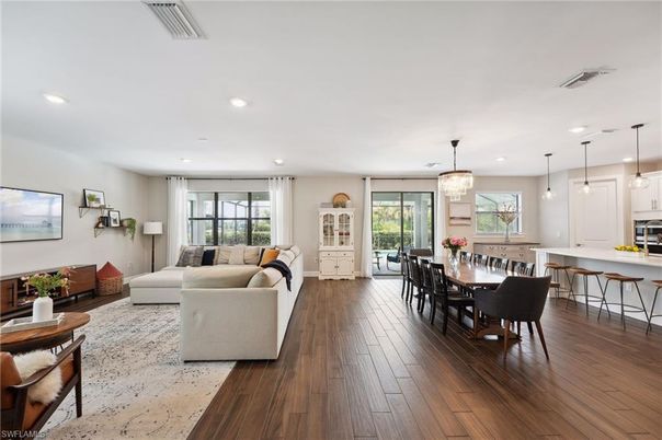 Chandelier, Dining room, Interior, Kitchen, Living room, Pendant Lights, Recessed Lighting, Wood Texture Flooring