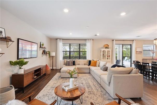 Dining room, Fireplace, Interior, Living room, Recessed Lighting, Wood Texture Flooring