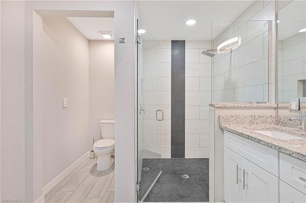 Bathroom, Glass Shower, Interior, Recessed Lighting, Wood Texture Flooring