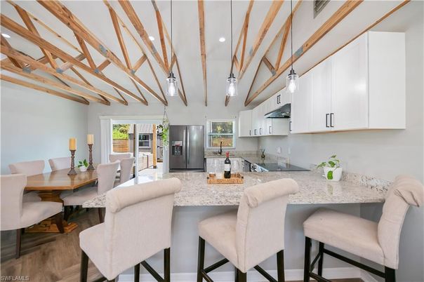 Dining room, Interior, Kitchen, Pendant Lights, Recessed Lighting, Stainless Steel Appliances, Wooden Beams, Wood Texture Flooring