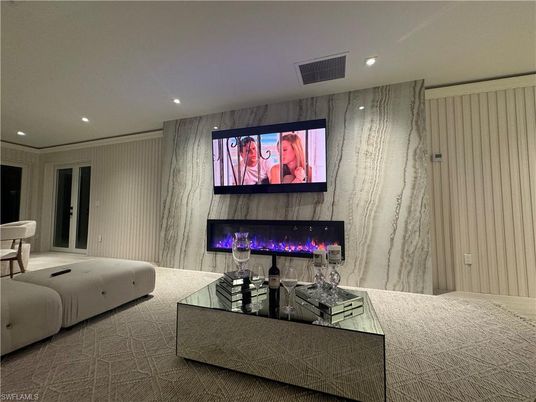 Fireplace, Interior, Marble Walls, Recessed Lighting