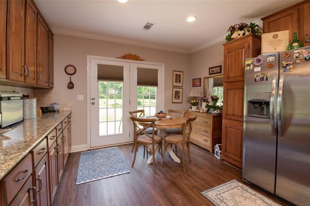 Dining room, Interior, Kitchen, Recessed Lighting, Stainless Steel Appliances, Wood Texture Flooring