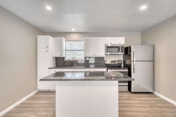 Interior, Kitchen, Recessed Lighting, Stainless Steel Appliances, Wood Texture Flooring