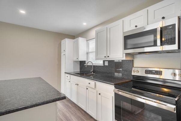Interior, Kitchen, Recessed Lighting, Stainless Steel Appliances, Wood Texture Flooring