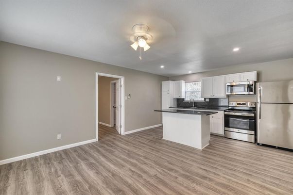 Interior, Kitchen, Recessed Lighting, Stainless Steel Appliances, Wood Texture Flooring