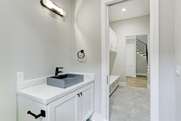 Bathroom, Dual Sink Vanities, Interior, Recessed Lighting, Wood Texture Flooring