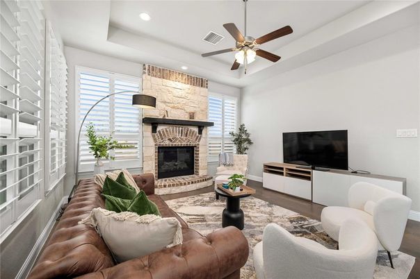Fireplace, Interior, Living room, Recessed Lighting, Stone Walls, Wood Texture Flooring