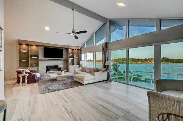 Fireplace, Interior, Living room, Recessed Lighting, Water, Wood Texture Flooring