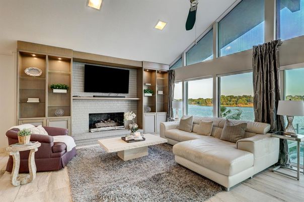 Fireplace, Interior, Living room, Recessed Lighting, Water, Wood Texture Flooring