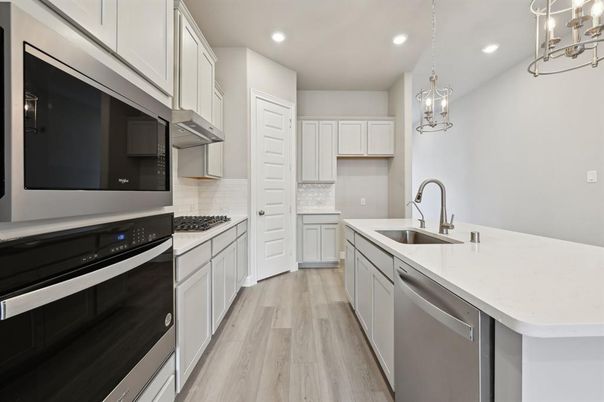 Interior, Kitchen, Pendant Lights, Recessed Lighting, Stainless Steel Appliances, Wood Texture Flooring