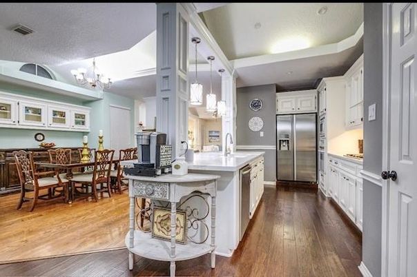 Chandelier, Dining room, Interior, Kitchen, Pendant Lights, Recessed Lighting, Stainless Steel Appliances, Wood Texture Flooring