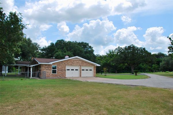 Attached, Backyard, Exterior, Facade, Brick Facade, Ranch