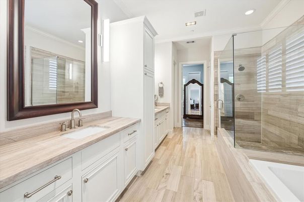 Bathroom, Dual Sink Vanities, Glass Shower, Interior, Recessed Lighting, Wood Texture Flooring