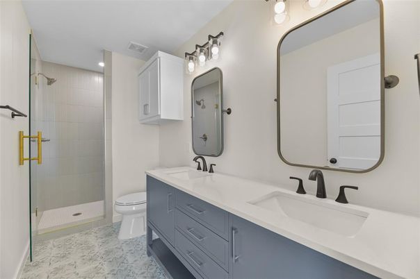 Bathroom, Dual Sink Vanities, Glass Shower, Interior, Marble, Recessed Lighting