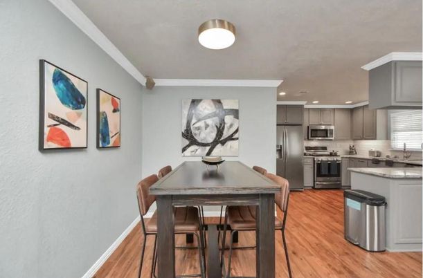 Dining room, Interior, Kitchen, Recessed Lighting, Stainless Steel Appliances, Wood Texture Flooring