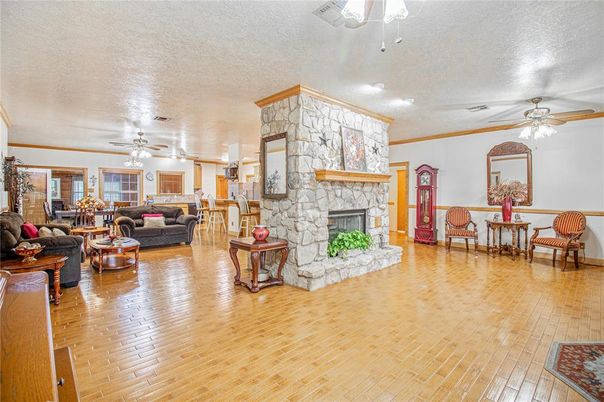 Dining room, Fireplace, Interior, Living room, Stone Walls, Wood Texture Flooring