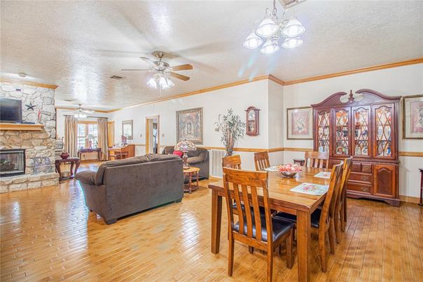 Dining room, Fireplace, Interior, Living room, Stone Walls, Wood Texture Flooring