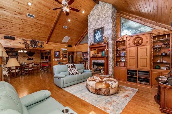 Dining room, Fireplace, Interior, Living room, Recessed Lighting, Stone Walls, Wooden Beams, Wooden Ceilings, Wood Texture Flooring, Wooden Walls