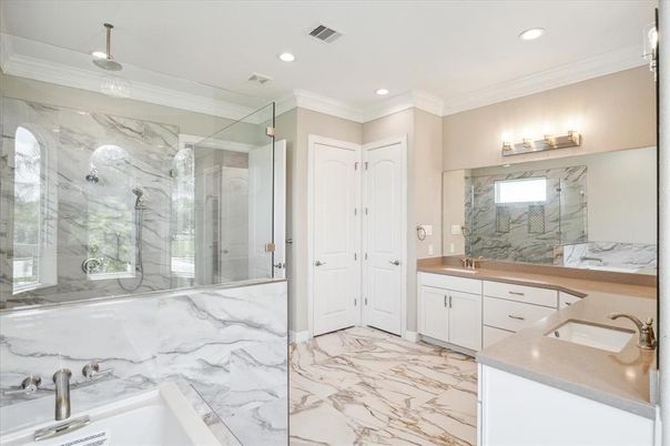 Bathroom, Dual Sink Vanities, Glass Shower, Interior, Marble, Marble Walls, Recessed Lighting