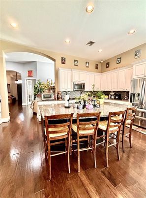 Dining room, Interior, Kitchen, Recessed Lighting, Stainless Steel Appliances, Wood Texture Flooring