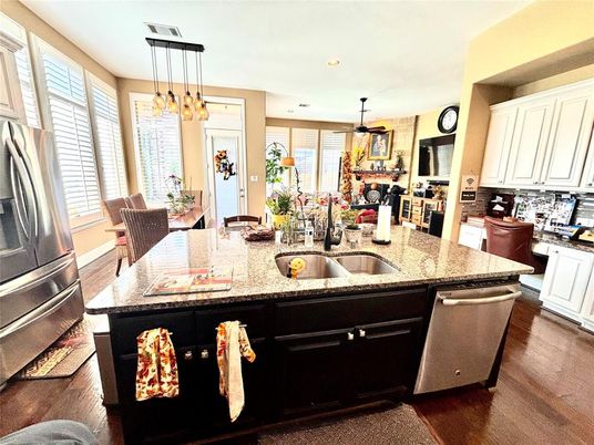 Dining room, Interior, Kitchen, Pendant Lights, Recessed Lighting, Stainless Steel Appliances, Wood Texture Flooring