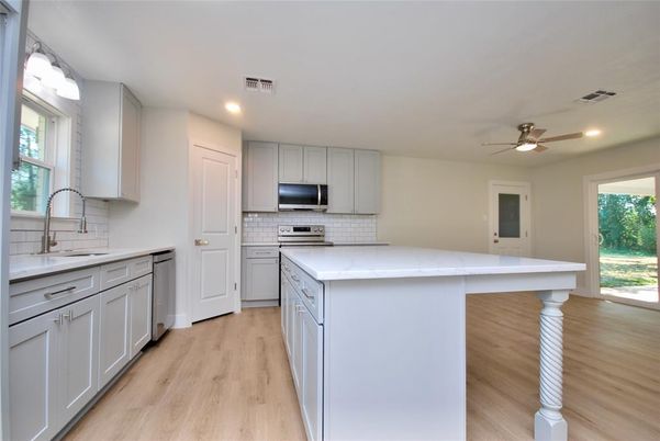 Interior, Kitchen, Recessed Lighting, Stainless Steel Appliances, Wood Texture Flooring