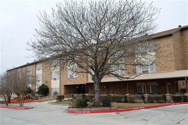 Exterior, Facade, Brick Facade, Condo Building