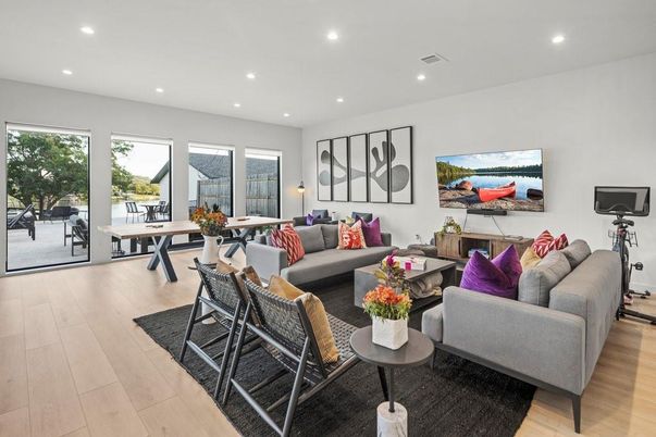 Fitness Equipment, Game Room, Interior, Living room, Recessed Lighting, Wood Texture Flooring