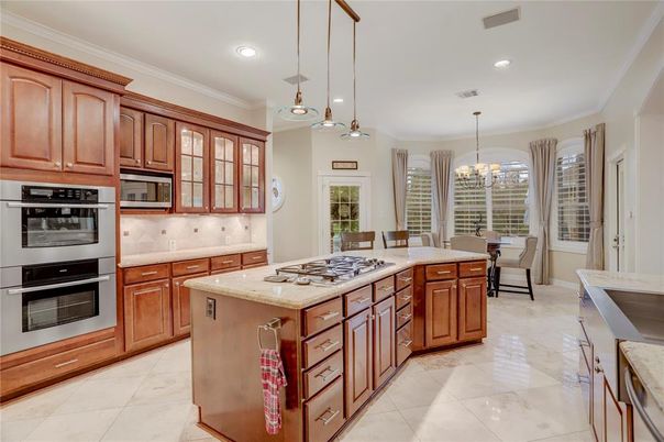 Chandelier, Dining room, Interior, Kitchen, Pendant Lights, Recessed Lighting, Stainless Steel Appliances