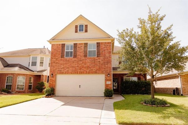 Attached, Exterior, Facade, Brick Facade, Brick Traditional