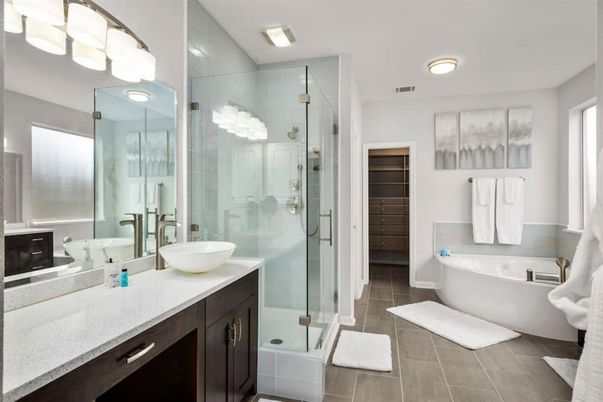 Bathroom, Dual Sink Vanities, Free Standing Baths, Glass Shower, Interior, Recessed Lighting, Wood Texture Flooring