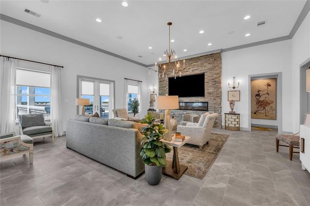 Chandelier, Fireplace, Interior, Living room, Recessed Lighting, Stone Walls