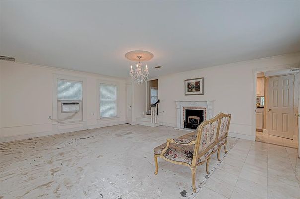Chandelier, Empty room, Fireplace, Interior