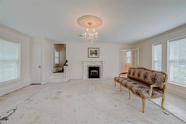 Chandelier, Empty room, Fireplace, Interior