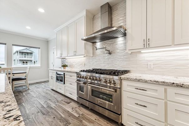 Dining room, Interior, Kitchen, Recessed Lighting, Stainless Steel Appliances, Wood Texture Flooring