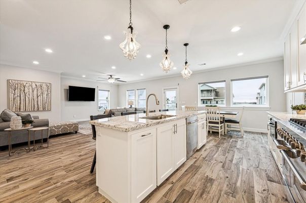 Dining room, Interior, Kitchen, Living room, Pendant Lights, Recessed Lighting, Stainless Steel Appliances, Wood Texture Flooring