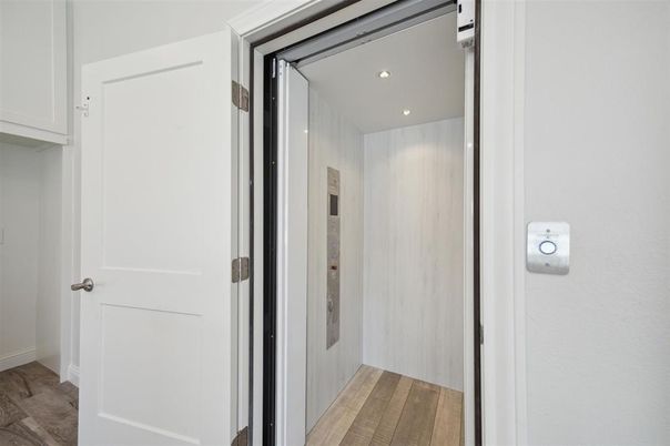 Elevator, Interior, Recessed Lighting, Wood Texture Flooring