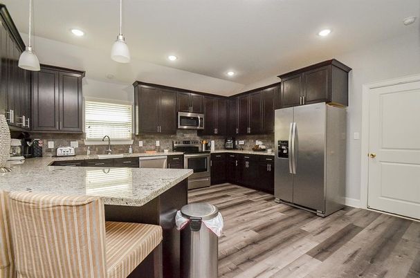 Interior, Kitchen, Pendant Lights, Recessed Lighting, Stainless Steel Appliances, Wood Texture Flooring