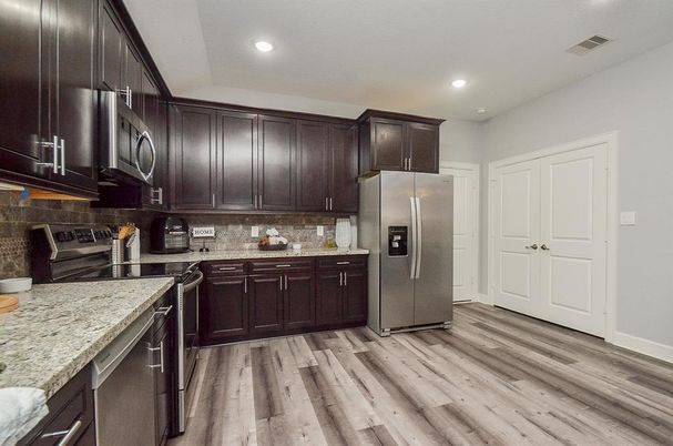 Interior, Kitchen, Recessed Lighting, Stainless Steel Appliances, Wood Texture Flooring