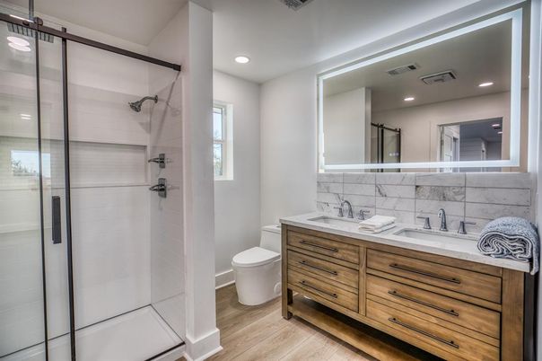 Bathroom, Dual Sink Vanities, Glass Shower, Interior, Recessed Lighting, Wood Texture Flooring