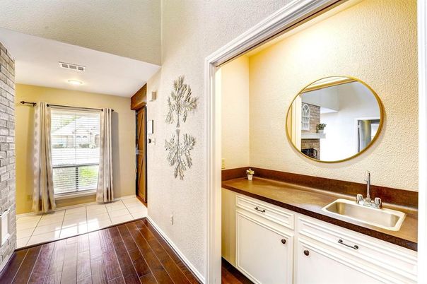 Bathroom, Dual Sink Vanities, Interior, Recessed Lighting, Wood Texture Flooring