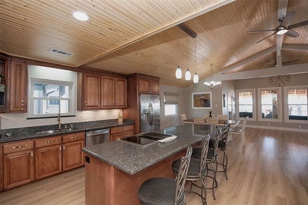 Dining room, Interior, Kitchen, Pendant Lights, Recessed Lighting, Stainless Steel Appliances, Wooden Ceilings, Wood Texture Flooring
