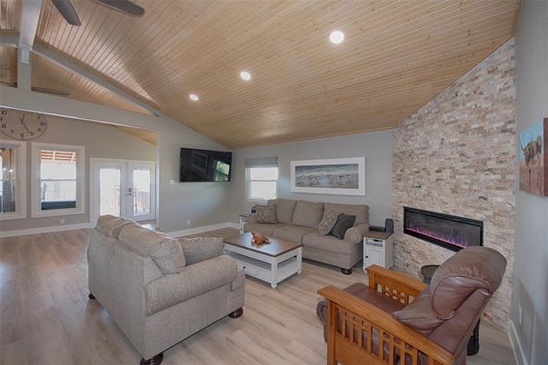 Fireplace, Interior, Living room, Recessed Lighting, Stone Walls, Wooden Ceilings, Wood Texture Flooring