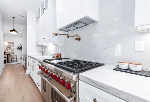 Interior, Kitchen, Marble Walls, Pendant Lights, Stainless Steel Appliances, Wood Texture Flooring