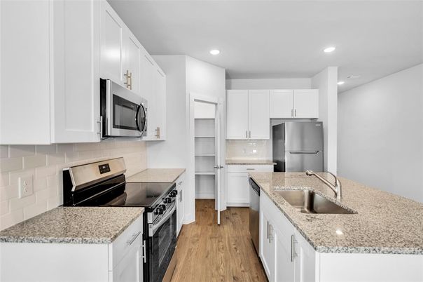 Interior, Kitchen, Recessed Lighting, Stainless Steel Appliances, Wood Texture Flooring