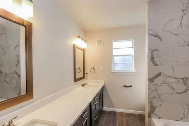 Bathroom, Dual Sink Vanities, Interior, Marble Walls, Wood Texture Flooring