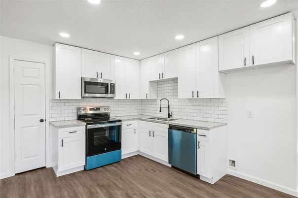 Interior, Kitchen, Recessed Lighting, Stainless Steel Appliances, Wood Texture Flooring